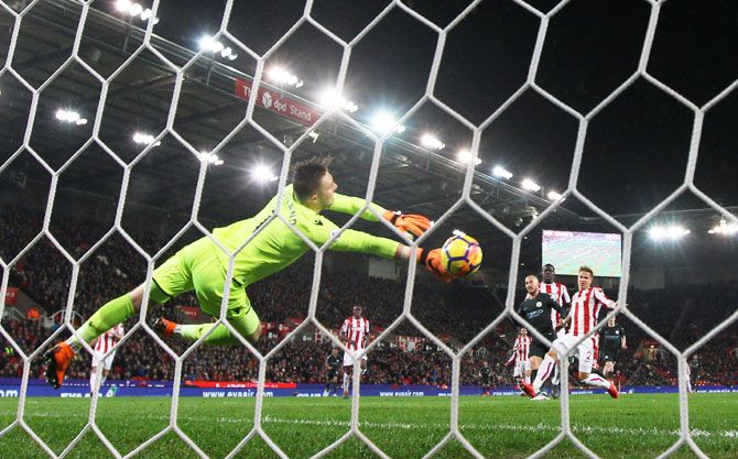 Manchester City's David Silva scores their first goal against Stoke City at bet365 Stadium, at Stoke-on-Trent on Monday