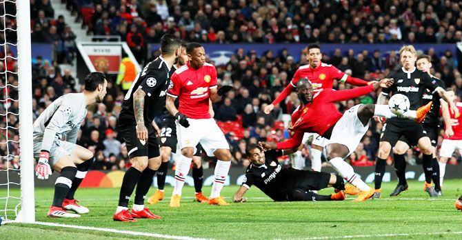 Manchester United's Romelu Lukaku scores their first goal against Sevilla