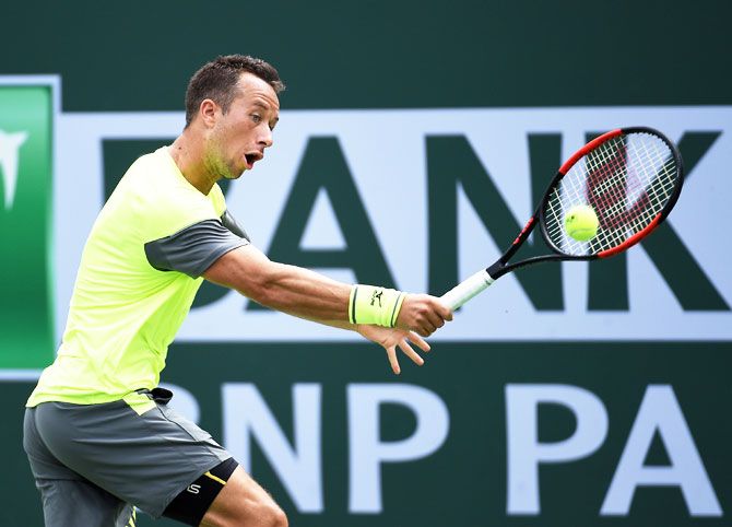 Germany's Philipp Kohlschreiber hits a backhand against Croatia's Marin Cilic on Day 9 of BNP Paribas Open in Indian Wells, California, on Tuesday