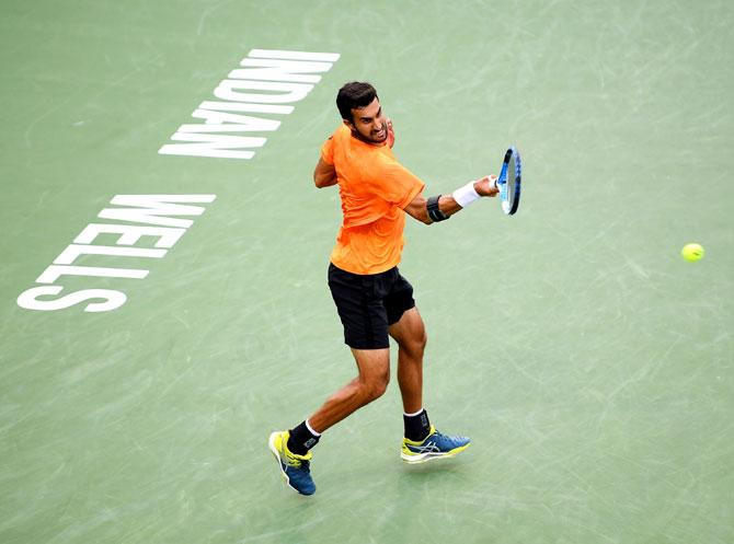 India's Yuki Bhambri plays a forehand match against USA's Sam Querrey