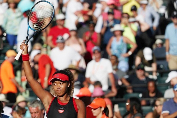 Naomi Osaka celebrates victory