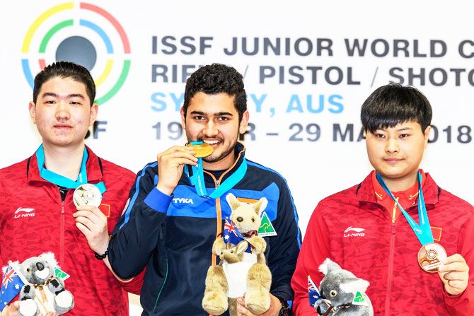 India's Anish Bhanwala on the podium with his gold medal at the ISSF Junior Shooting championships in Sydney on Monday