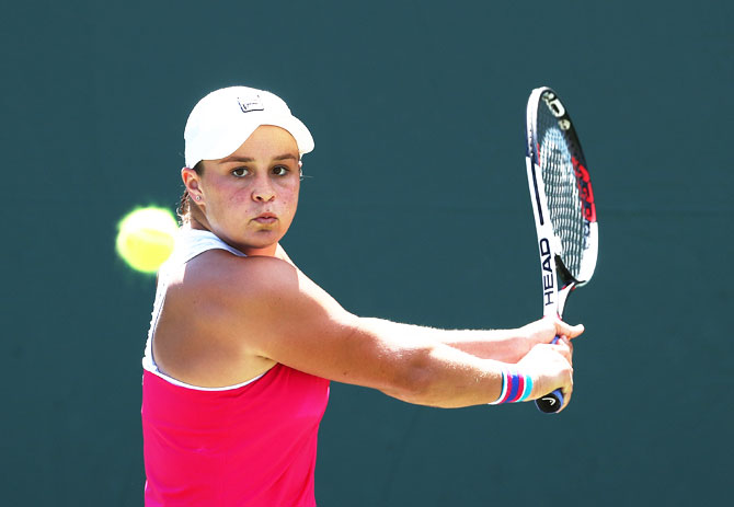 Australia's Ashleigh Barty returns a shot against Croatia's Petra Martic