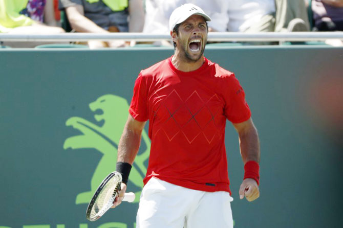 Spain's Fernando Verdasco reacts after winning a point against Australia's Thanasi Kokkinakis