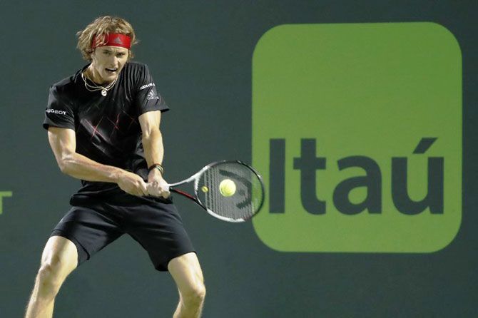 Germany's Alexander Zverev hits a backhand against Spain's David Ferrer on day seven of the Miami Open at Tennis Center at Crandon Park