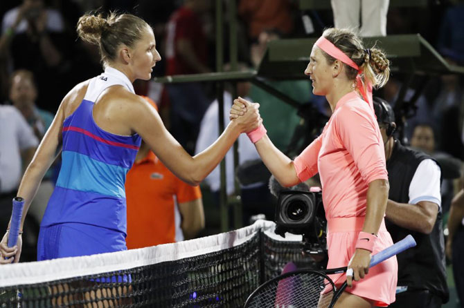 Belarus's Victoria Azarenka (right) is congratulated by the Czech Republic's Karoilina Pliskova after their match