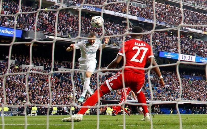 Karim Benzema scores