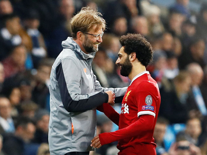 Liverpool manager Jueren Klopp and winger Mohamed Salah 