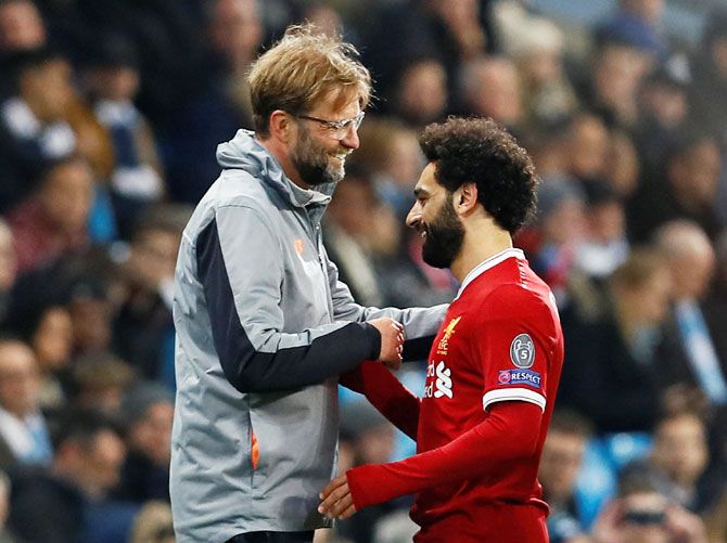 Liverpool manager Jueren Klopp and winger Mohamed Salah 
