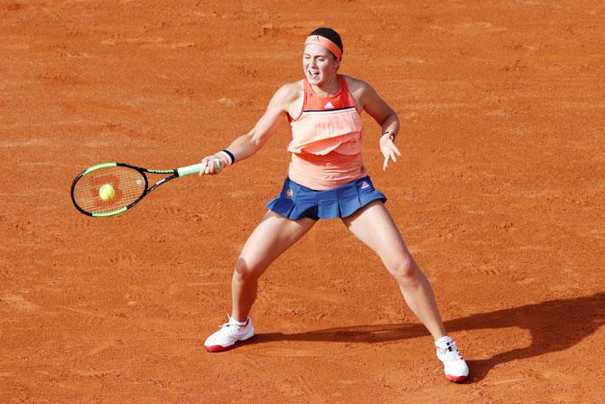 Latvia's Jelena Ostapenko in action during her first round match with Ukraine's Kateryna Kozlova