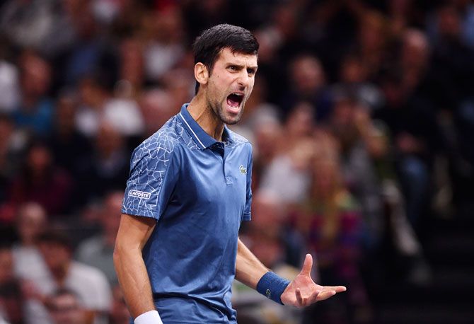 Serbia's Novak Djokovic reacts during his match against Karen Khachanov