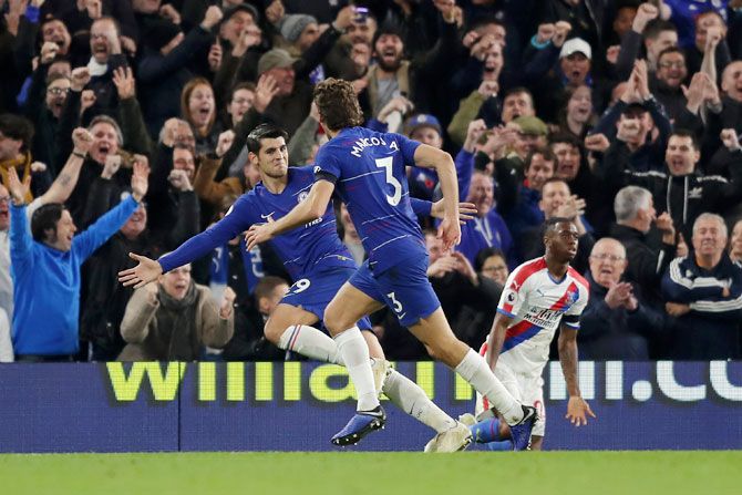 Chelsea's Alvaro Morata celebrates after scoring his team's second goal against Crystal Palace at Stamford Bridge in London