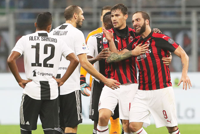 Serie A: Genoa hand Juve their first defeat, Napoli draw - Rediff.com