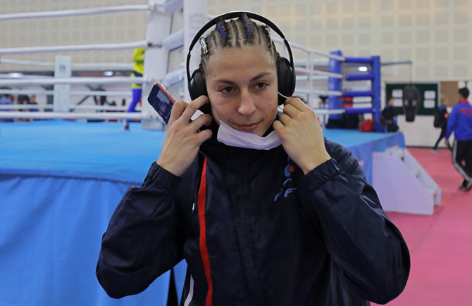 France's Mona Mestiaen removes a mask after her practice session on Monday