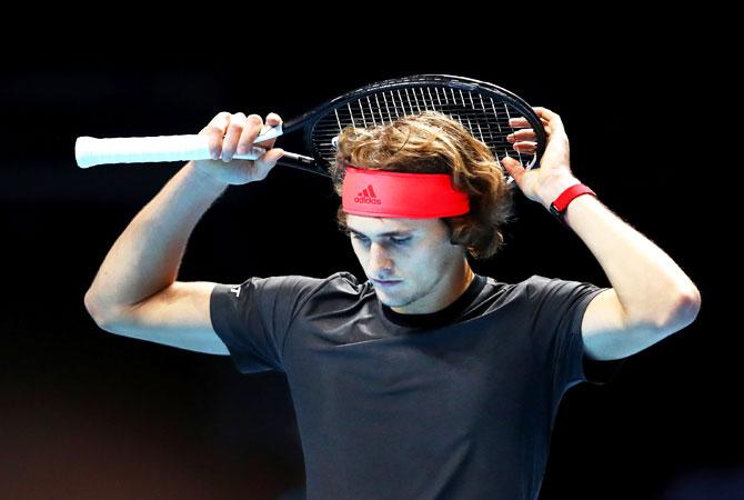 Alexander Zverev reacts during his singles round robin match against Serbia's Novak Djokovic