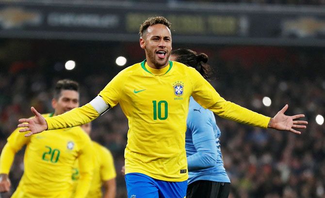 Brazil's Neymar celebrates after scoring the winner from the penalty spot 