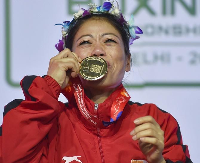 Mary Kom kisses her medal after she won gold in the Women's World Championships, November 24, 2018. Photograph: Ravi Choudhary/PTI