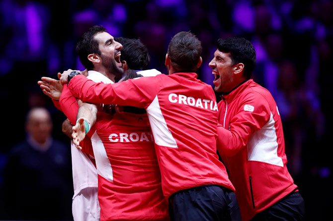 Team Croatia celebrate winning the Davis Cup after Marin Cilic beat France's Lucas Pouille on Sunday