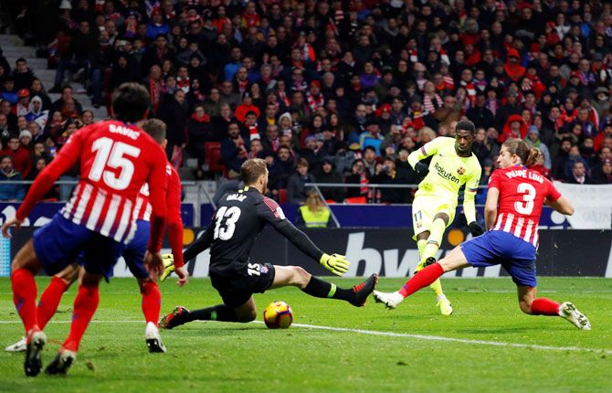Barcelona's Ousmane Dembele scores the equaliser against Atletico on Saturday