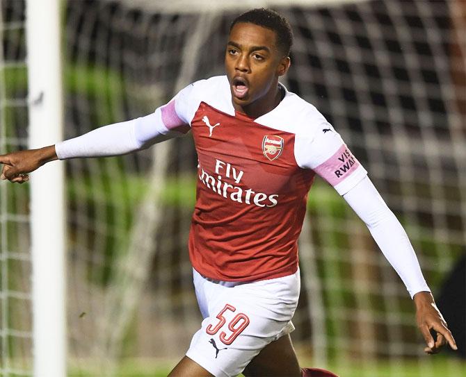 Arsenal's Joe Willock celebrates after scoring against Vorskla Poltava in Kiev on Thursday