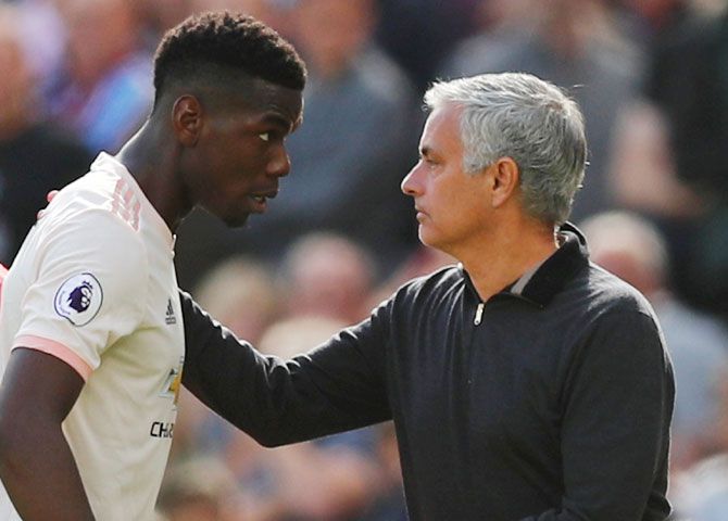 Manchester United's Paul Pogba with manager Jose Mourinho after being substituted off during the EPL match against West Ham on Saturday