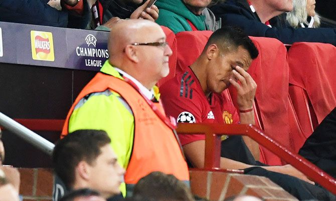 Manchester United's Alexis Sanchez cuts a frustrated figure after being substituted