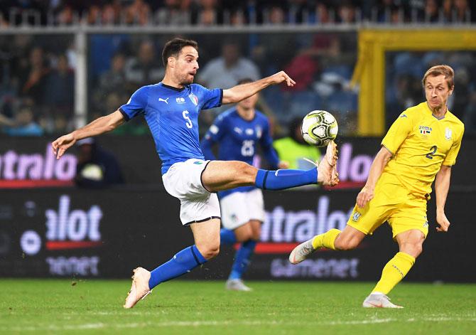 Italy's Giacomo Bonaventura and Ukraine's Bohdan Butko vie for possession during a international football friendly at in Stadio Comunale Luigi Ferraris, Genoa, Italy on Wednesday