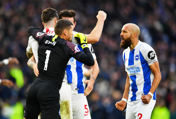 Brighton's Mathew Ryan, Shane Duffy, Lewis Dunk and Bruno Saltor celebrate after the match against Wolverhampton Wanderers