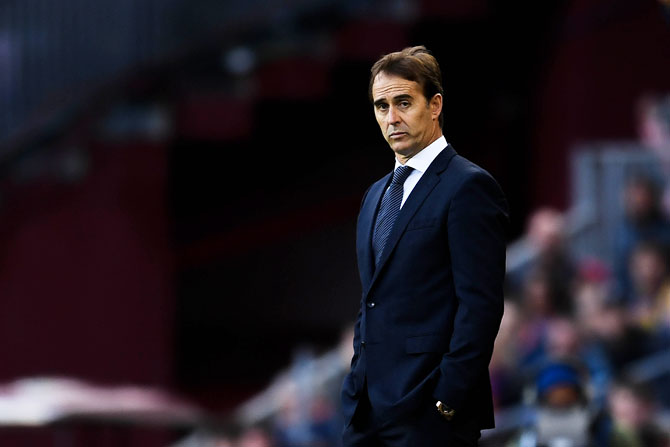 Real Madrid's head coach Julien Lopetegui looks on during the La Liga match between FC Barcelona and Real Madrid CF at Camp Nou on Sunday