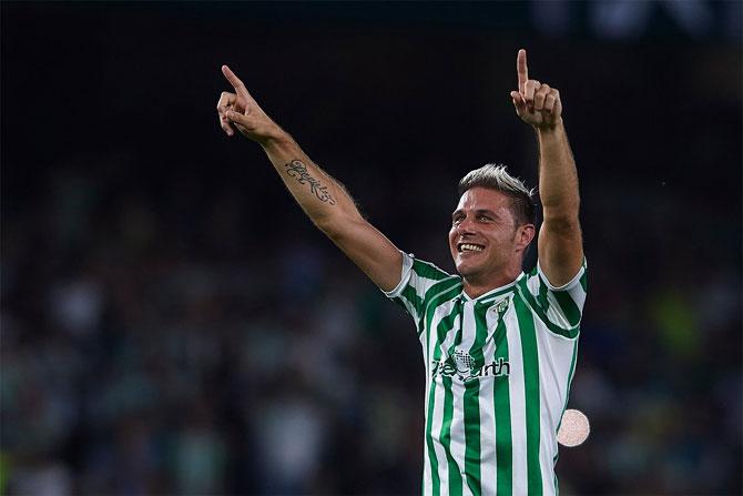 Real Betis' Joaquin celebrates on scoring against Sevilla