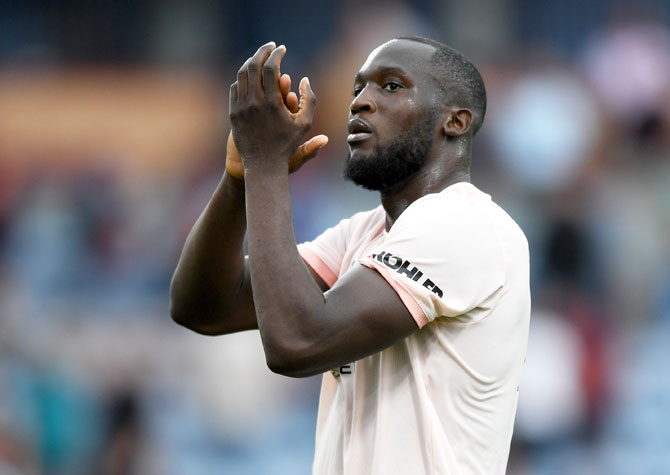 Romelu Lukaku applauds the fans