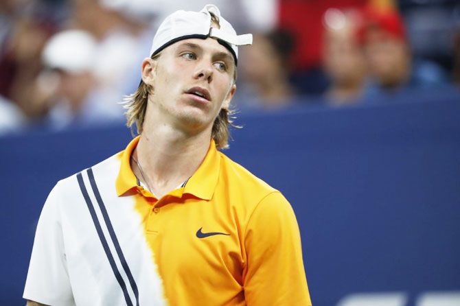 Canada's Denis Shapovalov reacts against South Africa's Kevin Anderson in the third round match on August 31