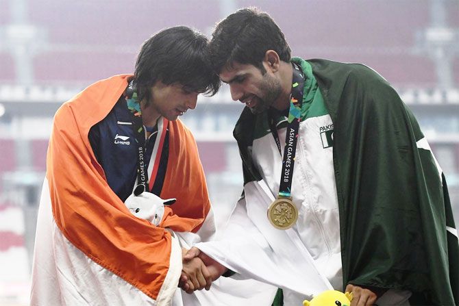 Neeraj Chopra and Arshad Nadeem greet each other on the podium at the Asian Games in 2018