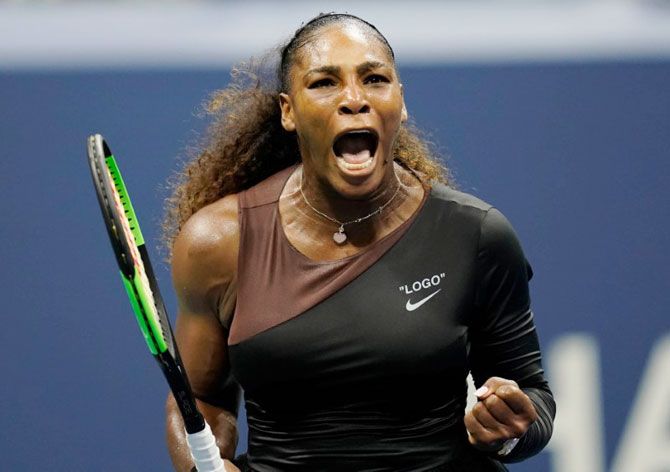 USA's Serena Williams reacts after winning a game in the second set during her quarter-final against Czech Republic's Karolina Pliskova at USTA Billie Jean King National Tennis Center