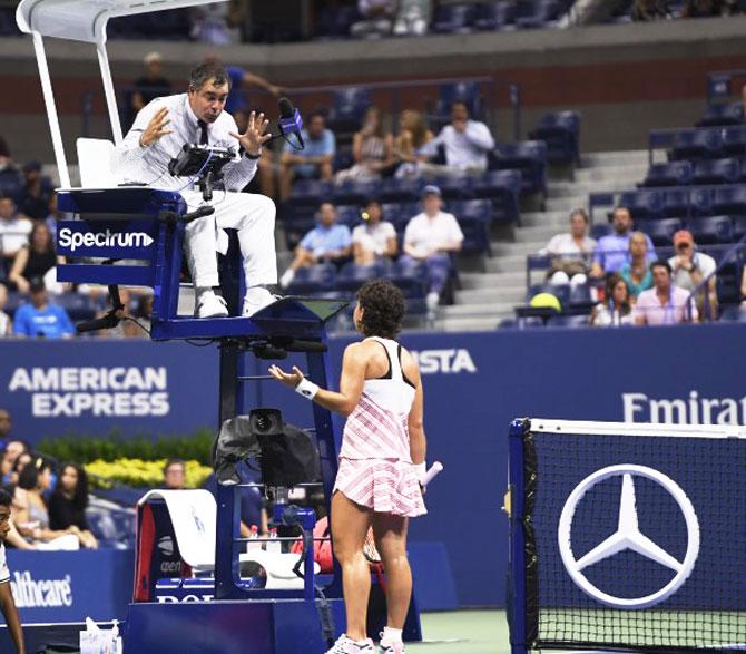 Carla Suarez Navarro talks to the chair umpire during the quarter-final