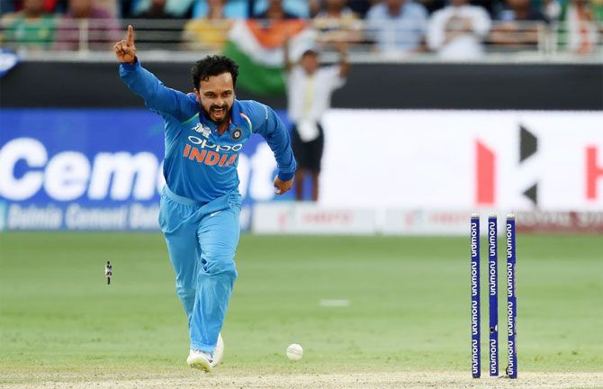 Kedar Jadhav celebrates taking a wicket against Pakistan during their Asia Cup match on Wednesday