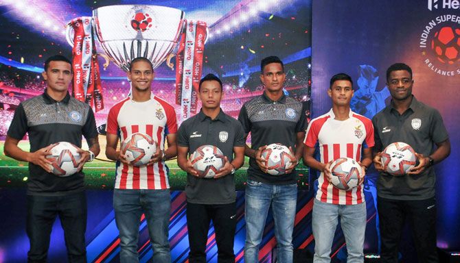 (Left to Right) Jamshedpur FC star player Tim Cahill, ATK player Gerson Vieira, NortEast United player Redeem Tlang, Jamshedpur player Subrata Paul, ATK player Eugenson Lyngdoh and NortheEast United's Bartholomew Ogbeche pose during a press conference for the upcoming Indian Super League in Kolkata, on Saturday