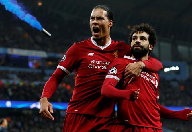 Virgil Van Dijk's (left) ability to pick a pass means Liverpool can turn defence into attack in the blink of an eye