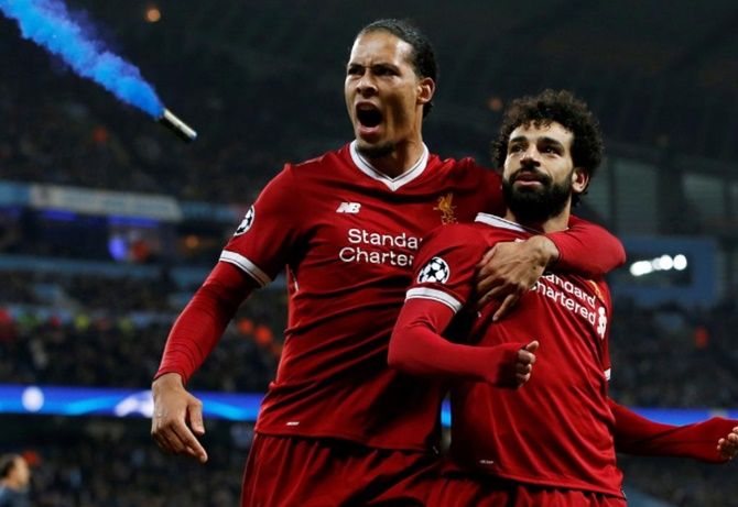 Virgil Van Dijk's (left) ability to pick a pass means Liverpool can turn defence into attack in the blink of an eye