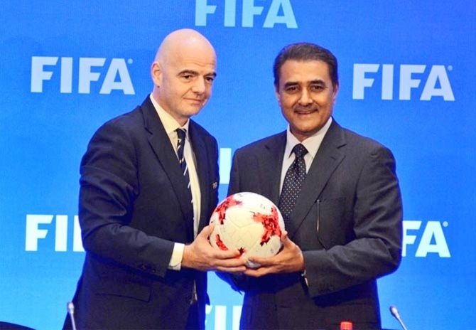 AIFF president Praful Patel, right, with FIFA president Gianni Infantino