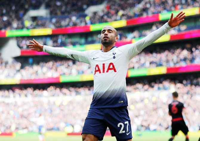 Lucas Moura celebrates scoring Tottenham's fourth goal to complete a hat-trick against Huddersfield at Tottenham Hotspur Stadium in London on Saturday