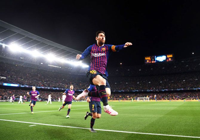 FC Barcelona'S Lionel Messi celebrates after scoring the first goal against Manchester United at Camp Nou in Barcelona