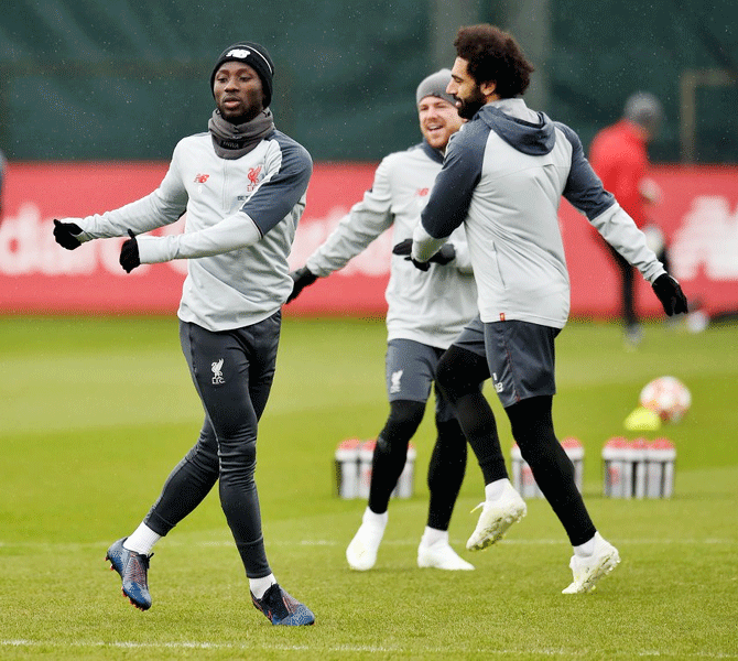 Liverpool's Mohamed Salah and teammates at training in Porto on Tuesday
