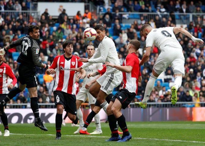 Real Madrid's Karim Benzema scores their second goal Athletic Bilbao during their La Liga match on Sunday