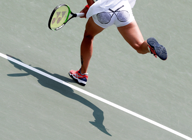 The Netherlands' Bibiane Schoofs in action during her match against Japan's Misaki Doi during their Fed Cup, World Group II Playoffs at ITC Utsubo Tennis Center, Osaka, Japan, on Sunday