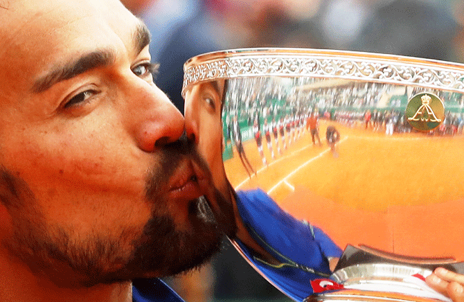 Italy's Fabio Fognini celebrates with the trophy after defeating Serbia's Dusan Lajovic to win the Monte Carlo Masters at Monte-Carlo Country Club, Roquebrune-Cap-Martin, France on Sunday
