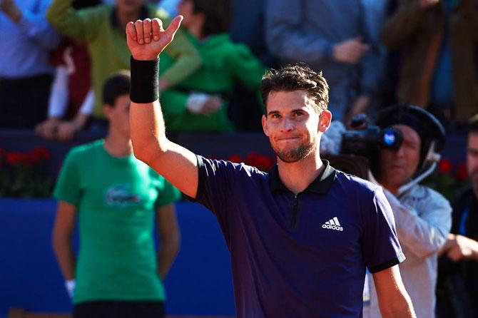 Austria's Dominic Thiem celebrates on defeating Spain's Rafael Nadal in the Barcelona Open semi-final at Real Club De Tenis Barcelona in Barcelona on Saturday