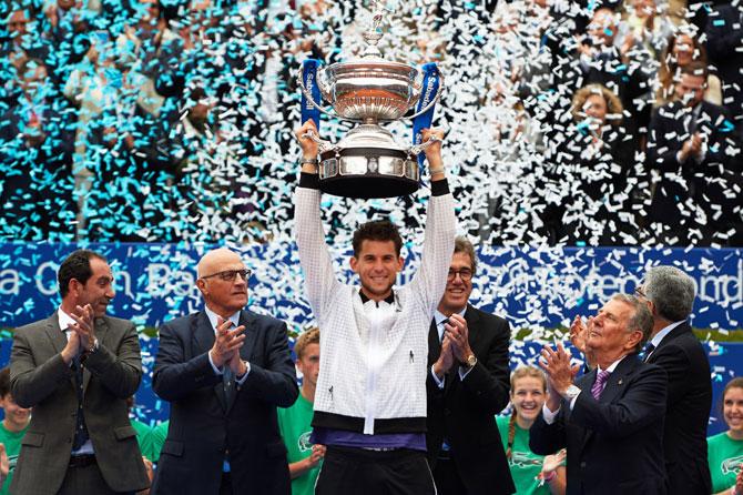 Austria's Dominic Thiem lifts the trophy after defeating Russia's Daniil Medvedev to win the Barcelona Open at Real Club De Tenis Barcelona in Barcelona, Spain, on Sunday