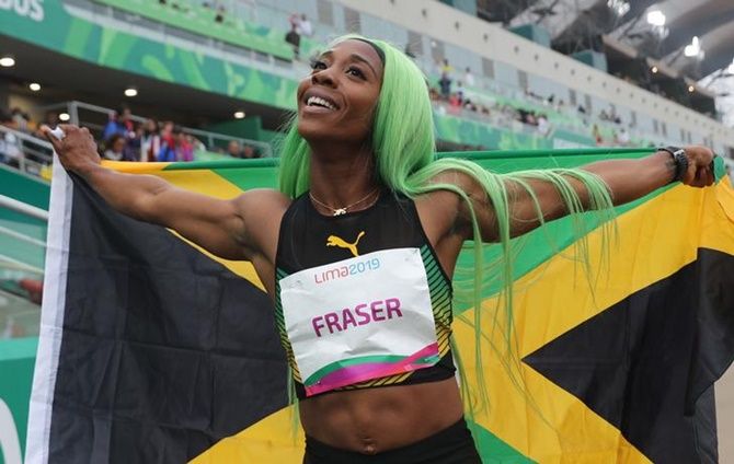Jamaica's Shelly-Ann Fraser-Pryce celebrates after winning the women's 200 metres final at the Pan American Games, in Lima, Peru, on Friday.