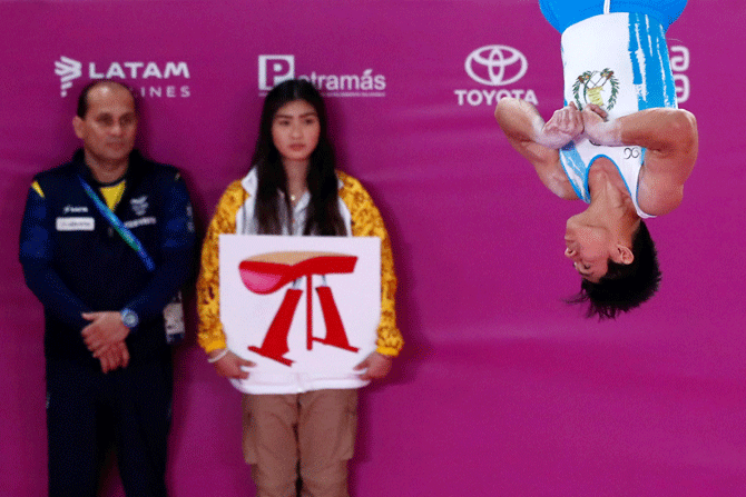Guatemala's Jorge Vega in action during the artistic gymnastics men's vault final at the Polideportivo Villa El Salvador on July 31